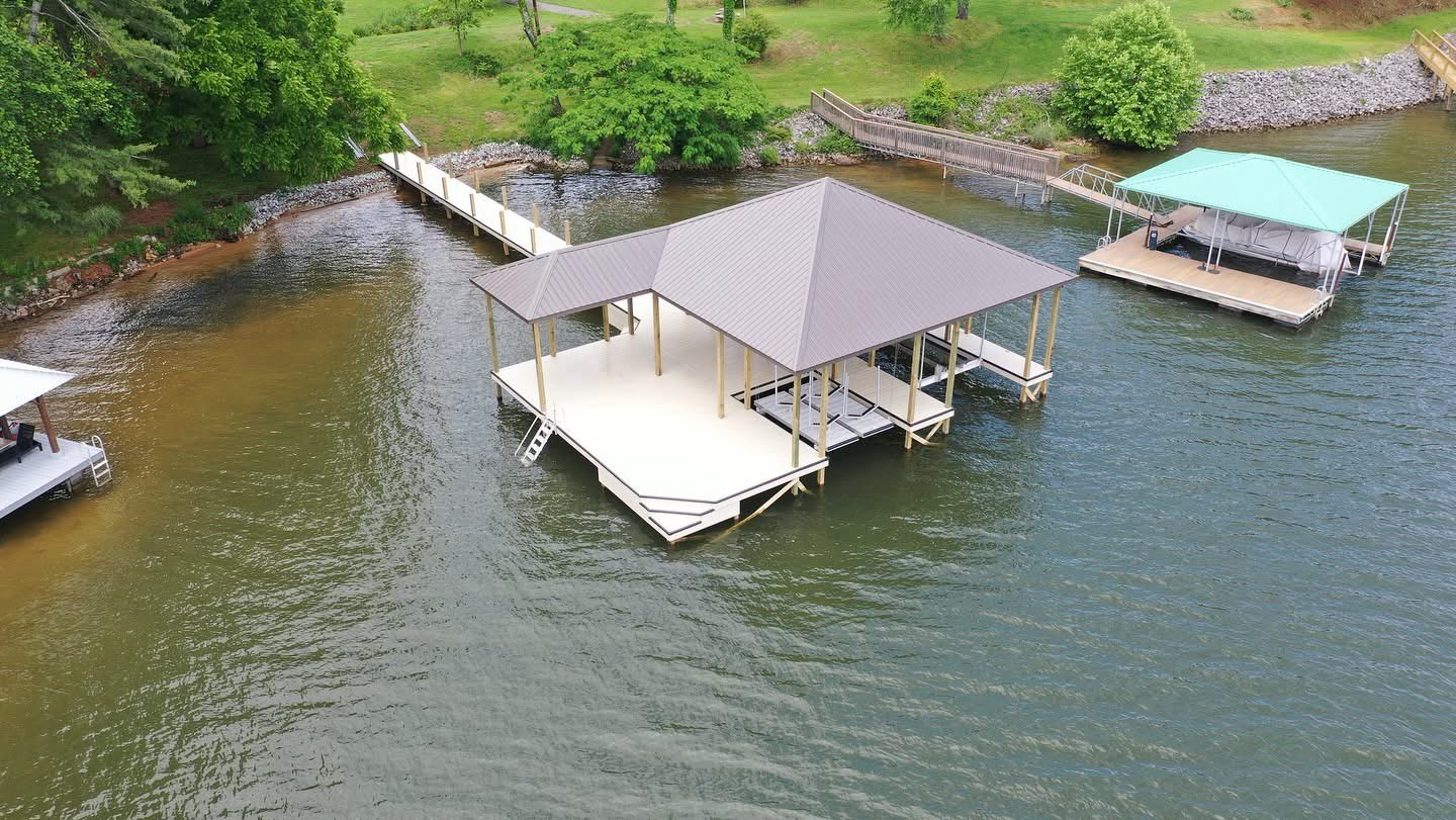 Aerial view of a finished covered dock with white decking