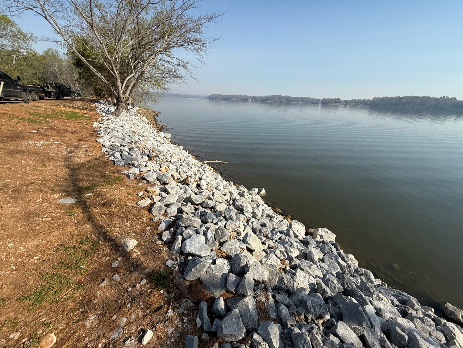 Rip rap stone placed along a lake shoreline to control erosion
