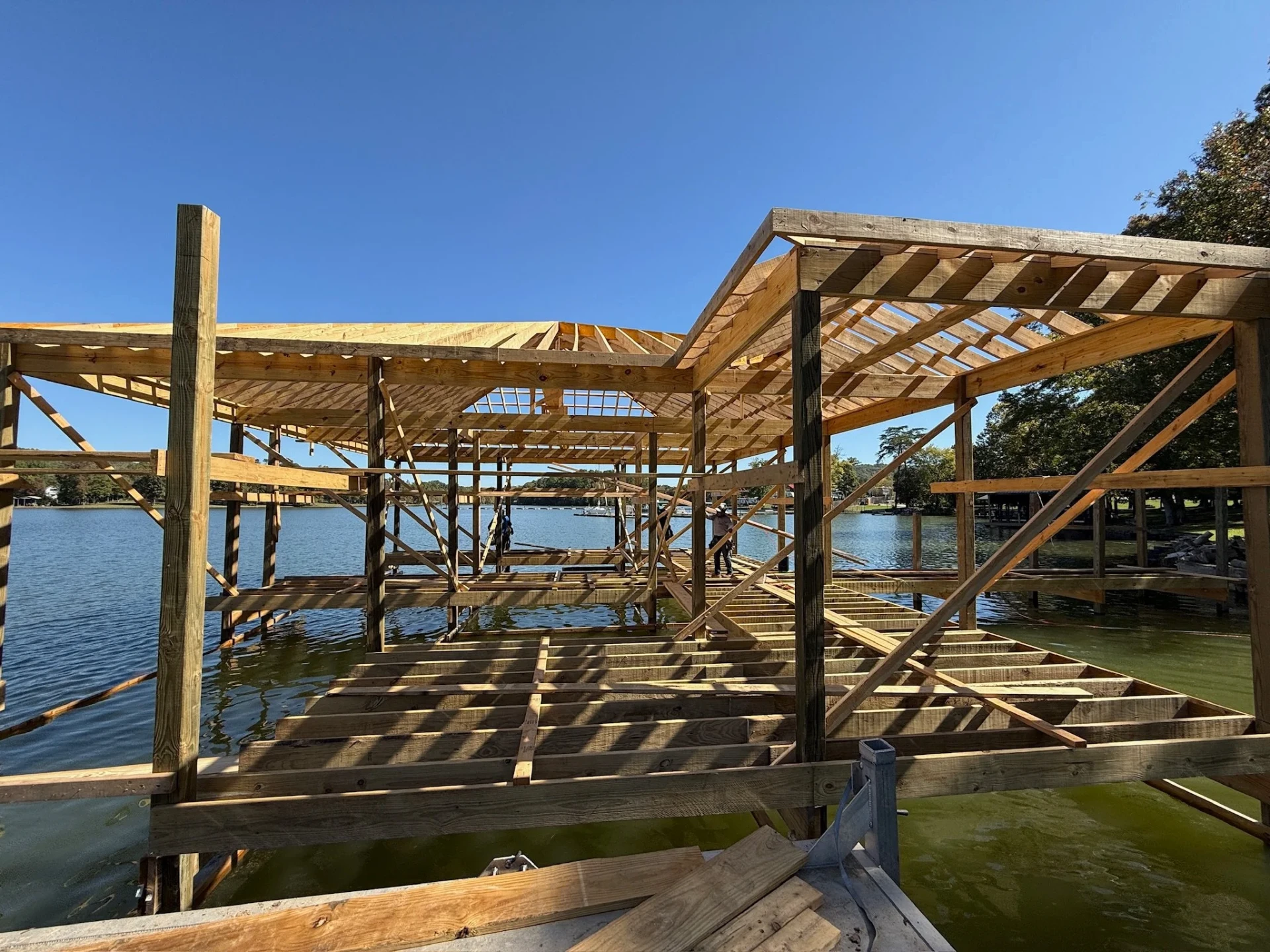 Dock roof framing under construction on a Georgia lake